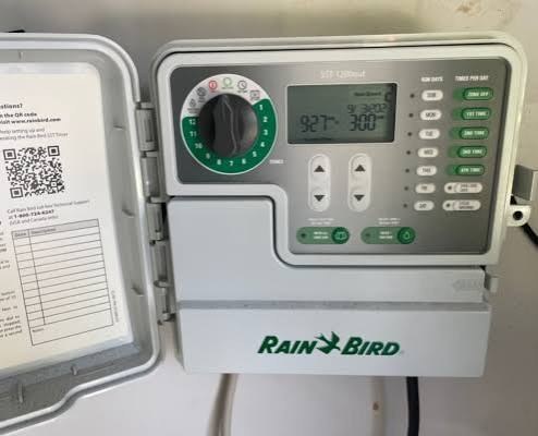 Irrigation system control panel checked during a Houston-area sprinkler inspection