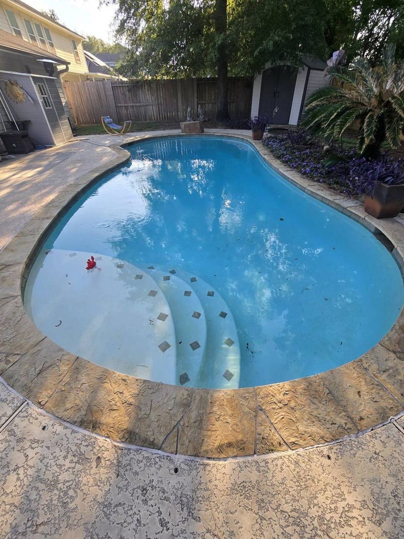 In-ground swimming pool inspection in the Houston area documenting water, deck, and equipment condition